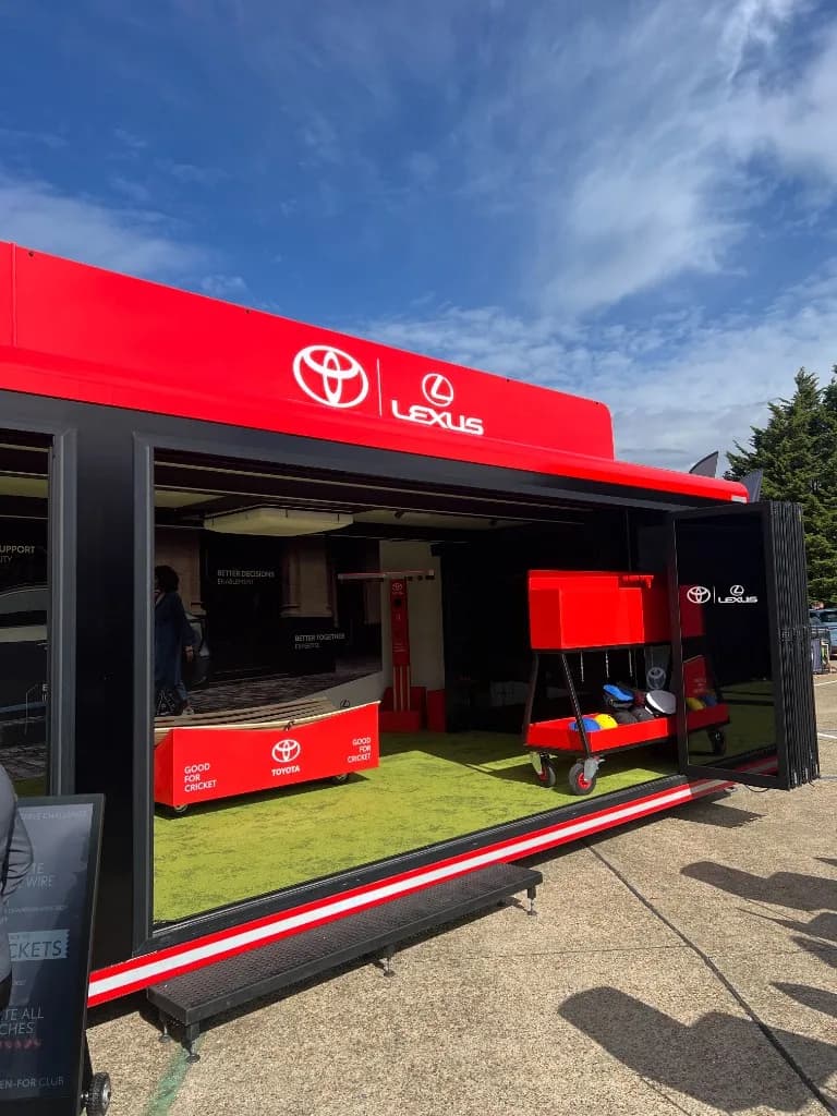 Toyota and Lexus exhibition stand at Company Car in Action with Powertrain Optimiser messaging on the back wall